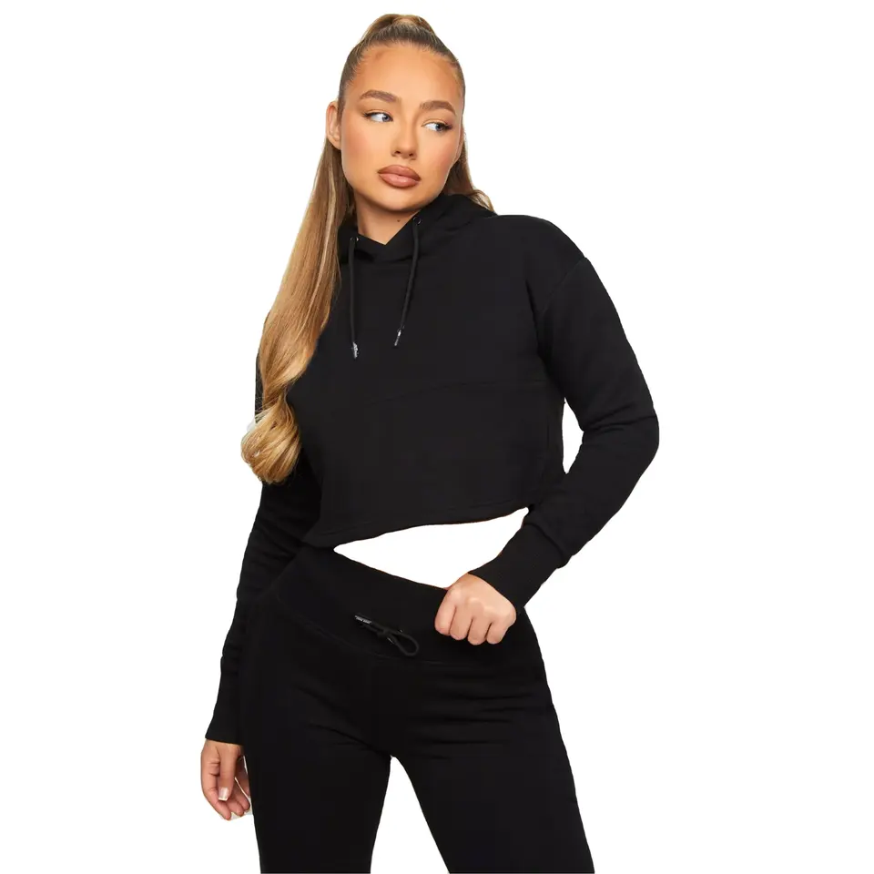 Cozy tracksuit image women wearing black crop top